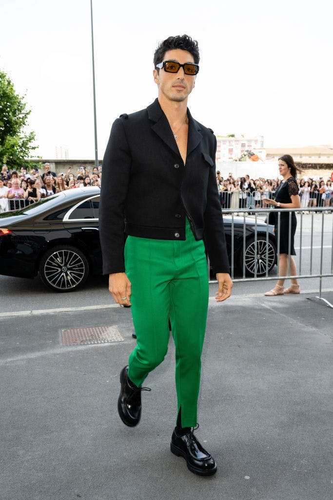 taylor zahkar perez best fashion moments; black blazer and green pants