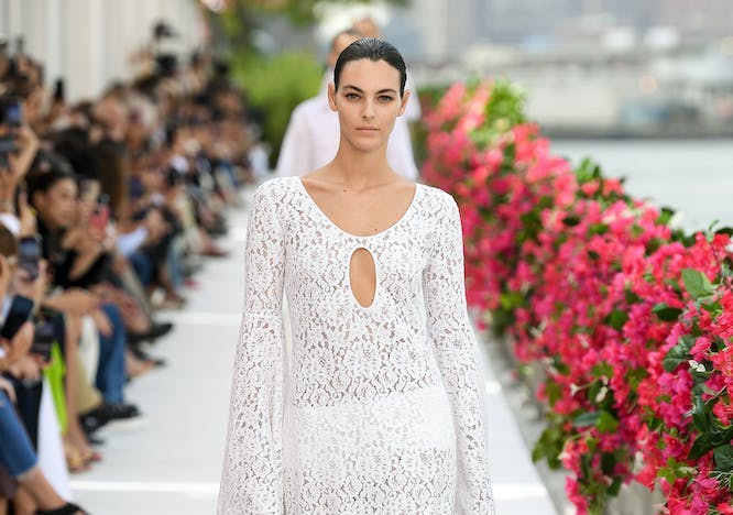 model in white lace gown