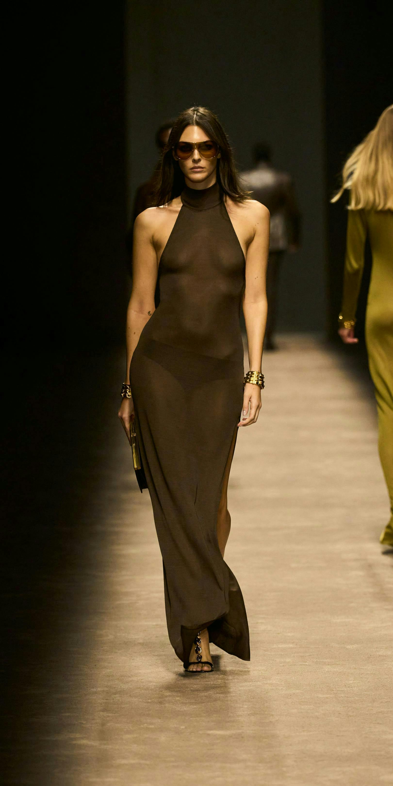 model in black sheer gown