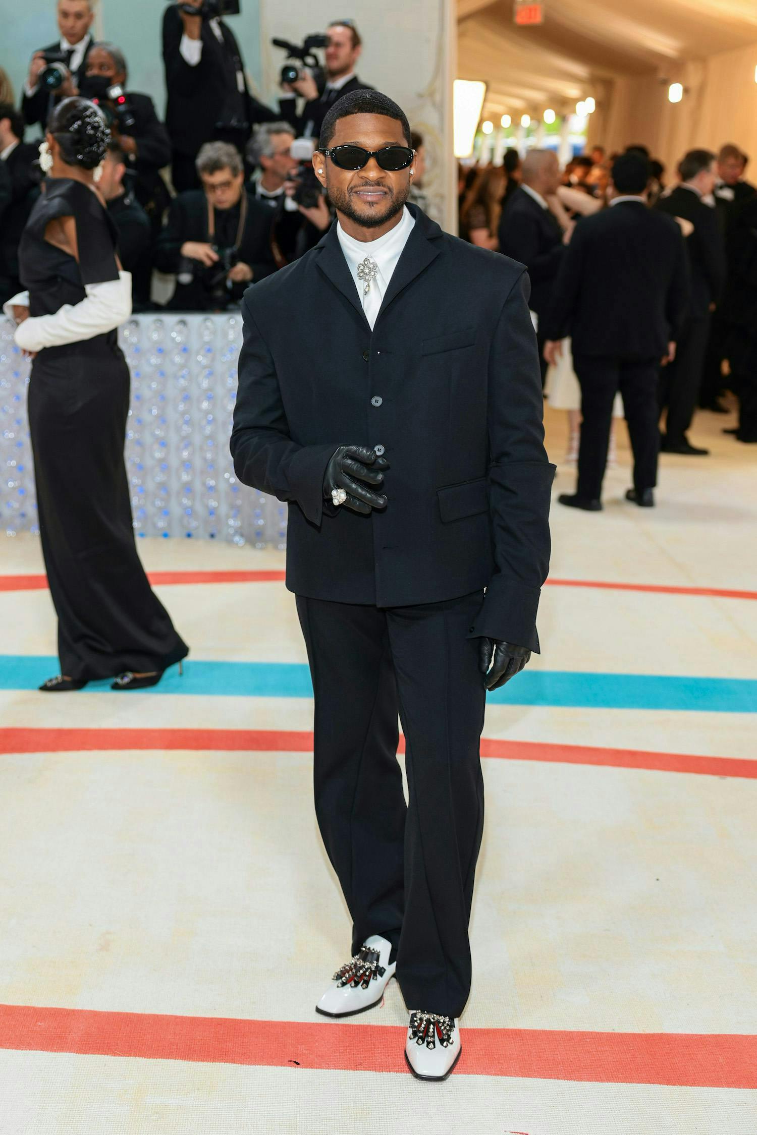 usher in a black suit