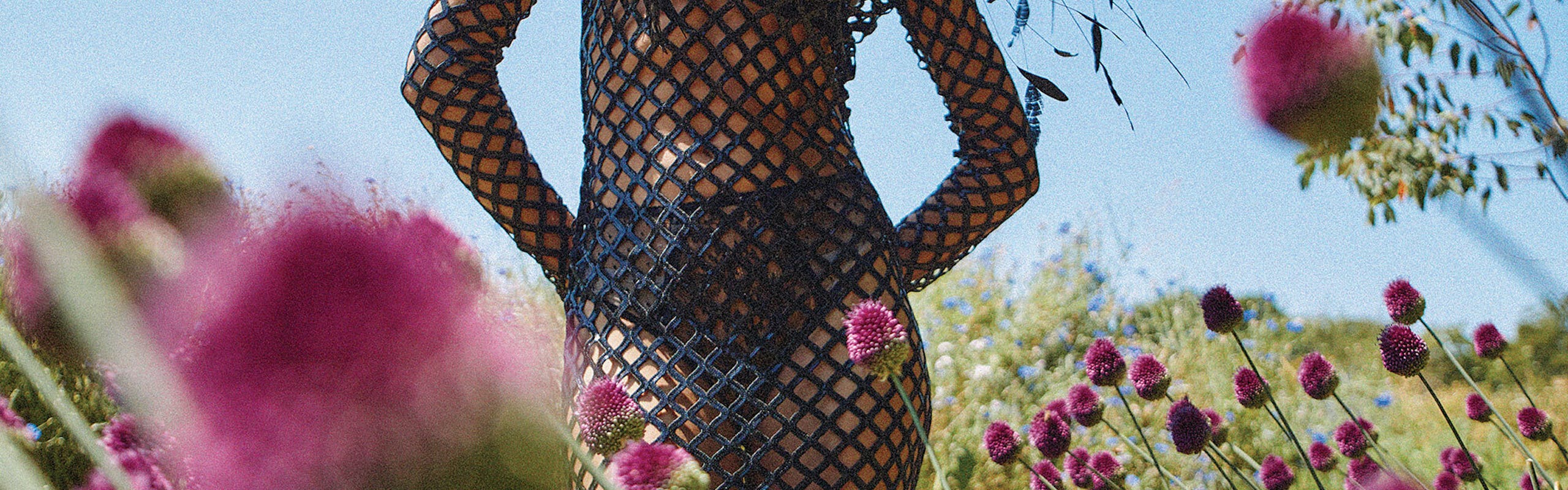 model wearing black lace set dress