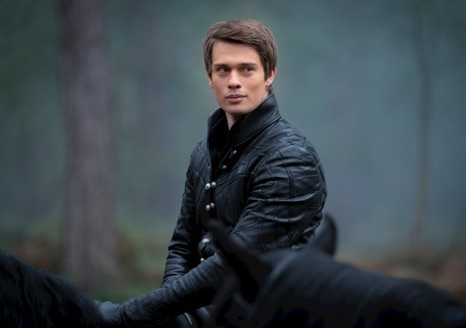 nicholas galitzine movies; dressed in a leather riding coat sitting on a horse