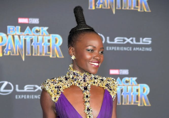 lupita in a purple gown and updo; break up; joshua jackson