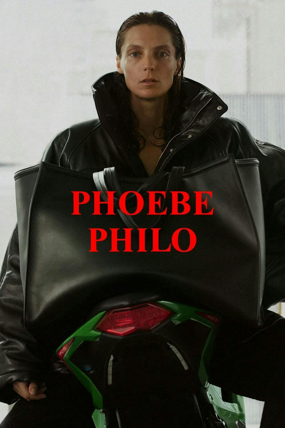model in oversized black coat by phoebe philo