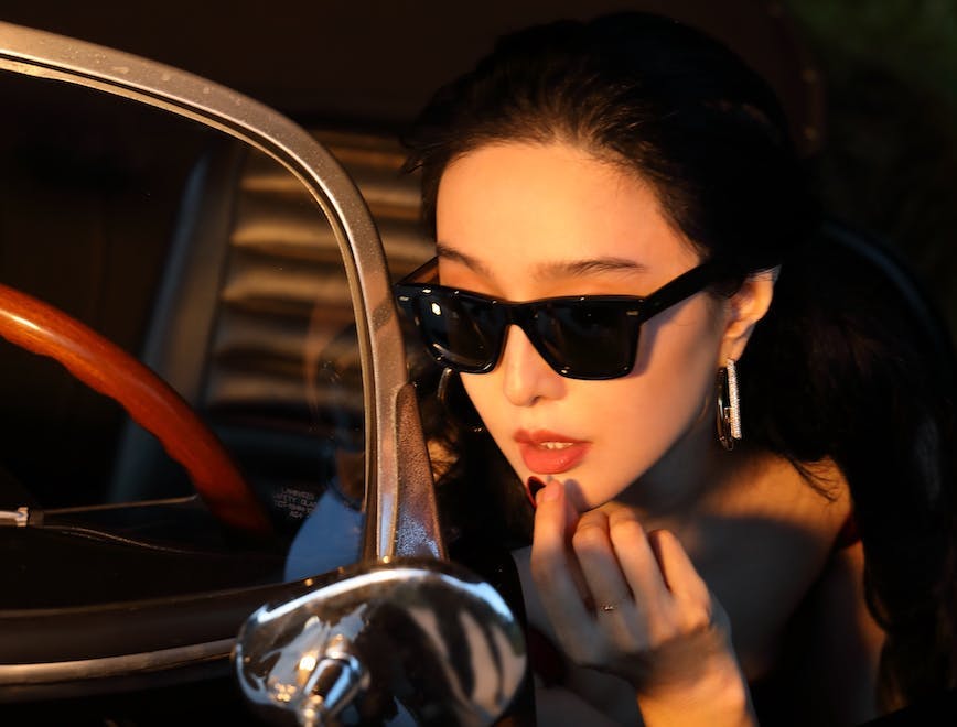 fan bingbing wearing sunglasses riding in car