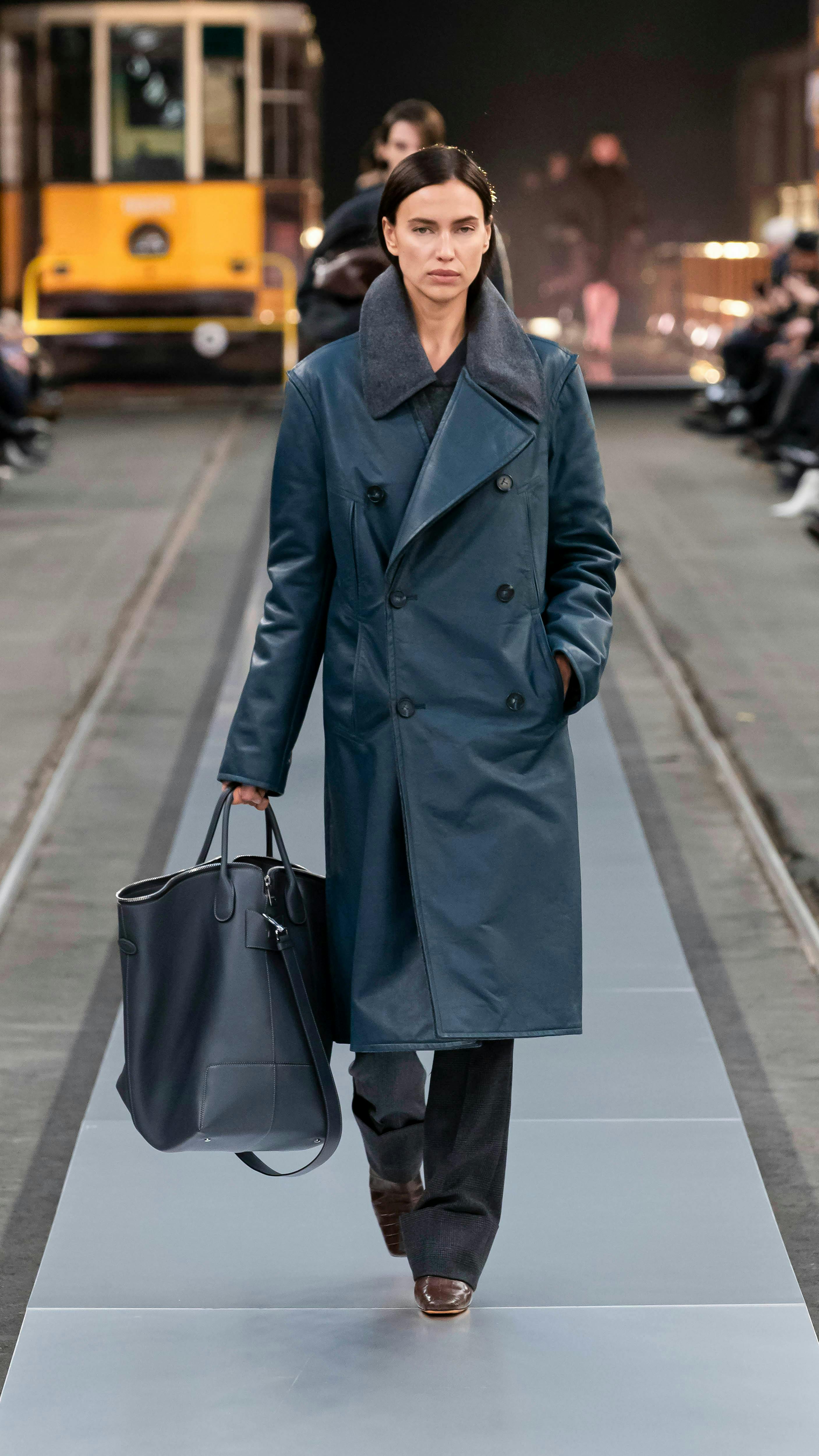 clothing coat adult female person woman overcoat accessories bag handbag