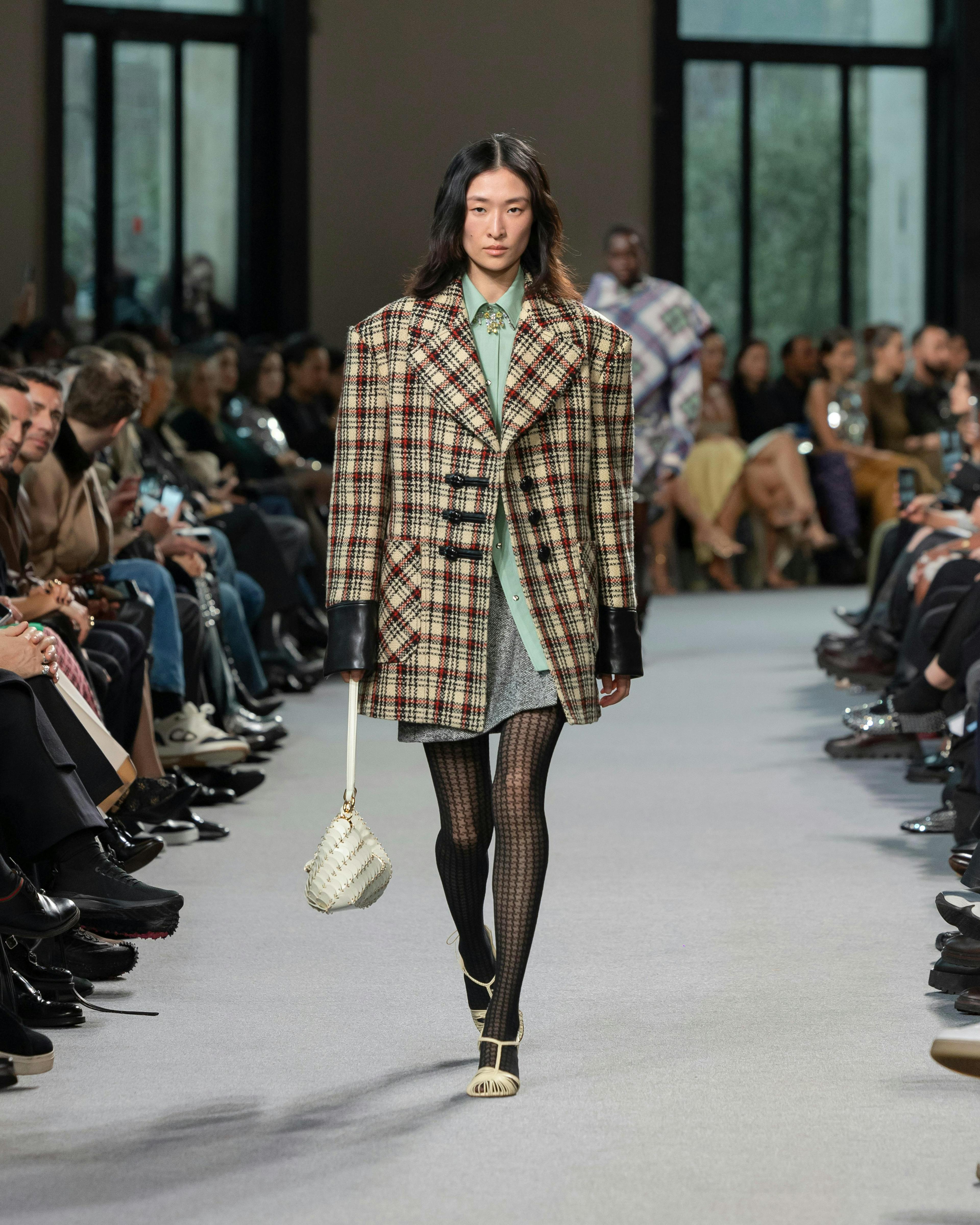 paris fashion clothing coat person bag handbag adult male man shoe