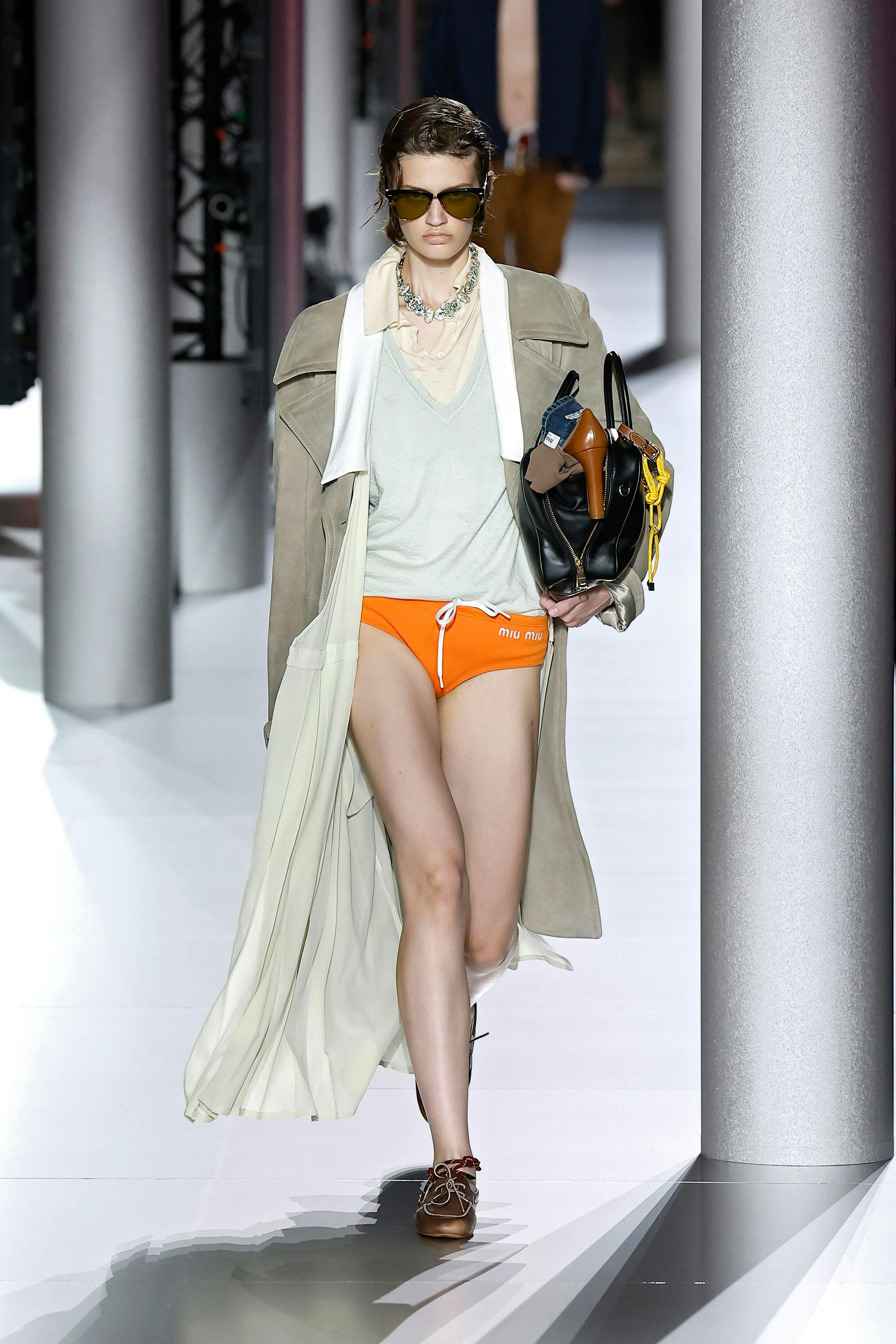 paris fashion adult female person woman bag handbag coat shorts necklace